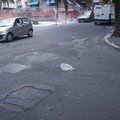 Buche e marciapiedi dissestati in via Lazzazzera